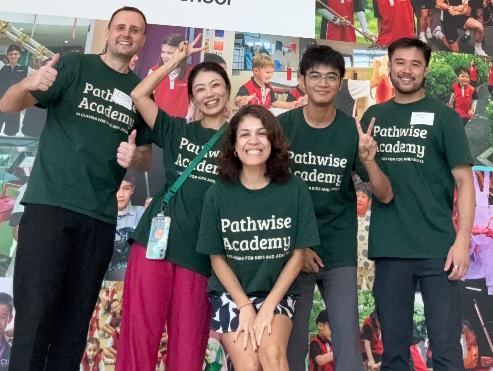 Alan Brown and the Pathwise Academy team in matching shirts, on site at a school AI camp